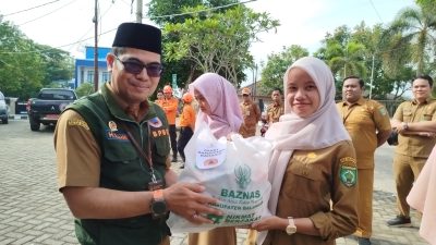 Penyaluran paket Ramadan oleh BPBD dan Baznas Balangan.